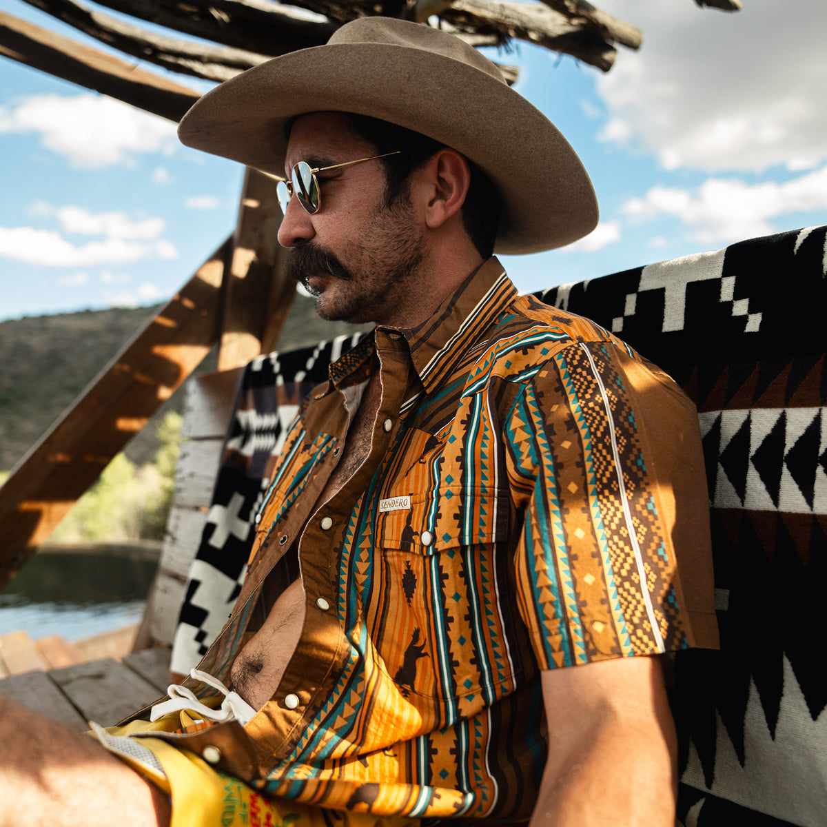 Serape Pearl Snap Short Sleeve - Walnut on model styled with cowboy hat